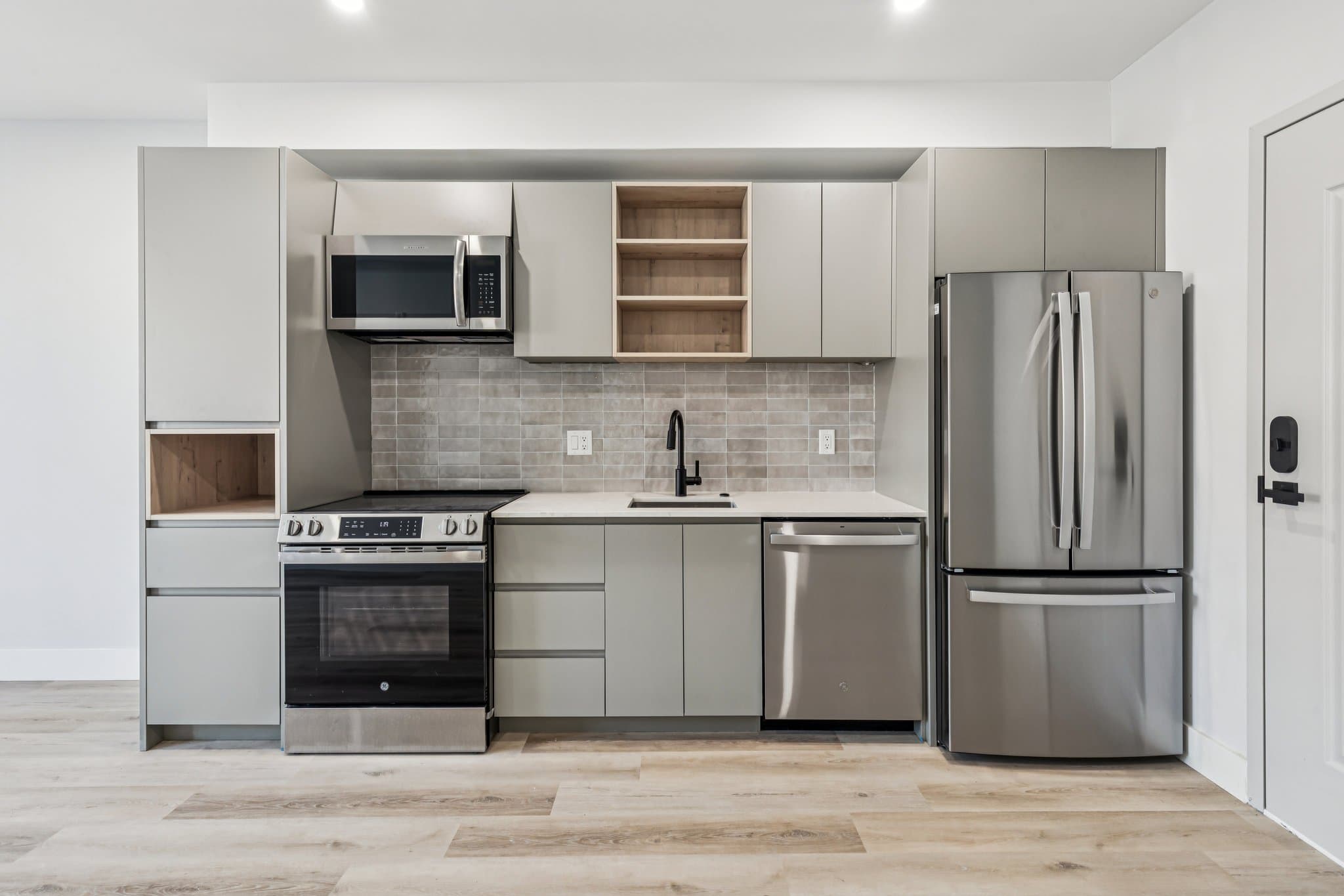 Minimalist kitchen with stone counters
